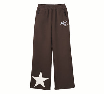 Black sweatpants with a white star and text on a white background